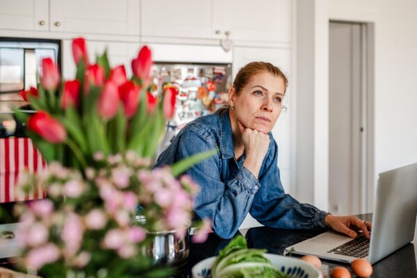 Woman reflecting on why she feels unhappy even though her life is good